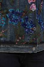 Load image into Gallery viewer, You won&#39;t find another denim jacket like this beauty! The detailing on our Everly is exquisite, featuring multi-colored sequins on the front, arranged in a beautiful floral shape. This fabulous jacket is a stunning way to introduce some sparkle into your outfit in a sophisticated manner. Color- Blue denim- Olive, gold, blue threading. Blue, lavender, purple, orange sequins. Silver buttons. Front button closure.
