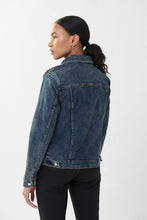 Load image into Gallery viewer, You won&#39;t find another denim jacket like this beauty! The detailing on our Everly is exquisite, featuring multi-colored sequins on the front, arranged in a beautiful floral shape. This fabulous jacket is a stunning way to introduce some sparkle into your outfit in a sophisticated manner. Color- Blue denim- Olive, gold, blue threading. Blue, lavender, purple, orange sequins. Silver buttons. Front button closure.
