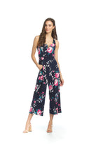 Load image into Gallery viewer, This lovely jumpsuit, with a striking navy and floral design, is a perfect addition to your summer wardrobe.  A beautiful fabrication offers comfort in those hot, humid days but is also a perfect style to wear in the cooler nights paired with a cardigan.
