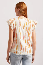 Load image into Gallery viewer, Texture can instantly jazz up any ensemble, and when combined with an attention-grabbing print, you have a design that slays the day in style. This short sleeve blouse is designed with fluttery cap sleeves, a v-neckline with bright colored tasseled ties and a flowy fit.   Perfectly matches our Silvia Side-Slit Straight Leg Jean by Tribal.  Color- Eggshell with pops of light orange and bright pink. V-Neck. Pullover. Colored tassel ties. Flowy fit.
