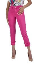 Load image into Gallery viewer, Darling is the perfect word to describe our Fiona vibrant fuchsia jean with triple fringing at hemline. Beautiful stretch and recovery to this playful jean makes this jean ultra-comfortable.  It will easily become one of your ultimate favorites!  Pair with our Dina Pink Multi Print Top by Frank Lyman for the perfect look. DINA PINK MULTI ABSTRACT PRINT TOP BY FRANK LYMAN – Aurora Lynn Boutique
