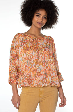 Make a statement in this gathered hem dolman tie back top in a beautiful kaleidoscope print.  Perfect for brunch or special occasions. Pairs beautifully with denim or a colored crop!   Color-Kaleidoscope; neon coral, vibrant teal green, cream and light brown. 24
