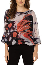 Load image into Gallery viewer, The butterfly is a symbol of new beginnings with rich glowing colors, bold butterfly wing patterns and new silhouettes. This gathered hem dolman top, with a gorgeous tie back is chic and elevated! Looks fabulous when worn with a black cami  or one of our Strap-It bras and pairs perfectly with denim or trousers!
