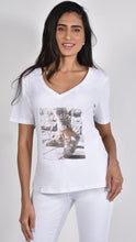 Load image into Gallery viewer, No matter how difficult times get, things always get better and our Faith tee by Frank Lyman reminds us of just that!   Not just an ordinary tee, this crisp white V-neck has the most darling design of two sneakers with bling and the saying &quot;It will get better.&quot;  When you wear this tee, your spirit will be lifted.  Wear under our Rita &quot;Love yourself first darling&quot; cardigan for a real positive vibe! As the tee has a more fitted design, we recommend sizing up one size.
