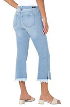 Load image into Gallery viewer, Our very fashionable Hannah Cropped Flare with Destructed Hem jean is so on trend!  Just the right amount of distressing at the hem gives an eye appealing detail while the fit of these fabulous crops will keep you feeling comfortable all day long.  So many different ways to style the Hannah, you can dress them up for a night out or down for running errands during the day.
