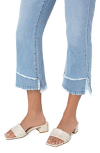 Load image into Gallery viewer, Our very fashionable Hannah Cropped Flare with Destructed Hem jean is so on trend!  Just the right amount of distressing at the hem gives an eye appealing detail while the fit of these fabulous crops will keep you feeling comfortable all day long.  So many different ways to style the Hannah, you can dress them up for a night out or down for running errands during the day.
