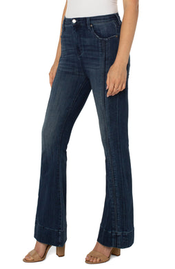 Flare denim is all the fashion and our Hannah High Rise Super Flare is absolutely in vogue! One of the most flattering jeans for women, this modern flare adds a graceful, curved silhouette that can accentuate your feminine figure.  Designed with amazing stretch and recovery, this jean is ultra comfortable and will not bag out.  Eye appealing trim detailing takes this fabulous jean to a whole new level.  Color- Rio Grande; Dark blue wash. Flare design. Hi-rise. Textured trim detailing.