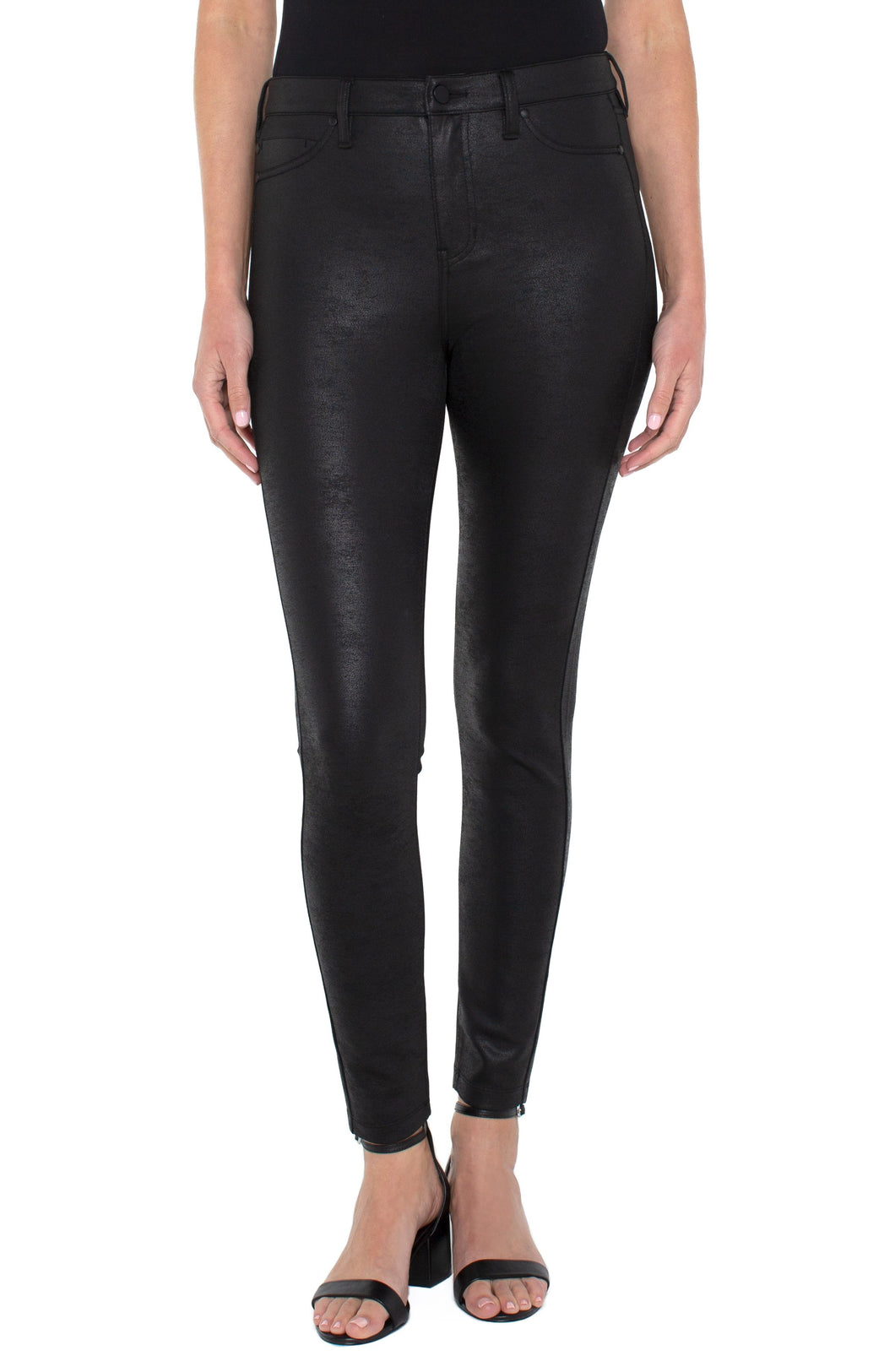 The signature Madonna legging in a black coated knit offers a classic look with a bit of edge with its subtle shine! Unique and classy, these leggings will look stunning paired with any top. Incredible comfort, the Madonna legging fits true to size, stretches with every movement but has fabulous recovery and does not end up bagging.  Stand out in a crowd with these attention-grabbing leggings! You will not be disappointed!  Color- Black. 29'' Inseam. Hi-rise.