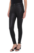 Load image into Gallery viewer, The signature Madonna legging in a black coated knit offers a classic look with a bit of edge with its subtle shine! Unique and classy, these leggings will look stunning paired with any top. Incredible comfort, the Madonna legging fits true to size, stretches with every movement but has fabulous recovery and does not end up bagging.  Stand out in a crowd with these attention-grabbing leggings! You will not be disappointed!  Color- Black. 29&#39;&#39; Inseam. Hi-rise.
