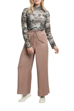 Palazzo pants offer versatility, comfort, and sophistication and they are so on trend! Our Harper Palazzo, with a high-rise design and wide leg style is a dramatic, yet subdued closet staple. A taupe gray color, allows these high fashion pants to be paired with almost any top in your wardrobe. Color-Taupe grey. Pull on. High rise. Wide leg.