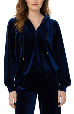 Get cozy and escape the crazy with this super soft and comfortable hooded raglan zip pullover.  A stylish fit, this beautiful zip up hoodie wows with its striking midnight blue color.  A perfect style to spend your entire day in, you will find yourself choosing to wear this pullover again and again. 
