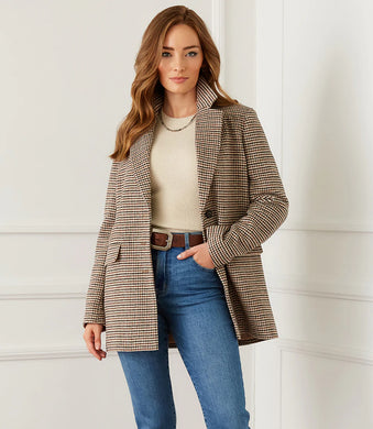 You can never go wrong with a beautiful blazer to elevate an outfit. Richly textured yarns come together to create our Helena polished houndstooth blazer. It's tailored from a cozy wool blend and lined with luxurious silky charmeuse. This classic blazer is versatile enough for the office or after hours. Color- Houndstooth- Brown, black and cream. Lined. Button down Flap pockets.