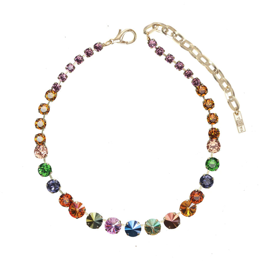 A beautiful array of fall color crystals come together to create a spectacular necklace.  Take any outfit to new heights when you wear this outstanding piece.
