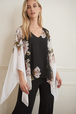 Stunning in all ways, this gorgeous, flowy cape sleeve top by Joseph Ribkoff is definitely a head turner.  Black, white, pink, and olive colors come together in a floral print to create a lovely top that easily can we worn all year long.   Colors-Black, white, pink, olive green. Cape sleeve. Flowy material lays over a black tank lining. V-neck.