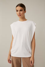 Load image into Gallery viewer, A top that goes with literally everything in your closet, our Wenda white drop sleeve is the perfect style to have on hand for all your needs. The Wenda is an elevated look, not quite a traditional short sleeve and not a tank but a perfect combination of the two. Simple, yet classic, the Wenda looks beautiful worn alone or under a jacket.  
