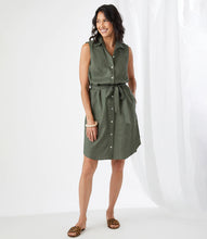 Load image into Gallery viewer, A look that can easily transition from day to evening, our Olena dress is the perfect style for those hot, summer days. Made with lightweight and breathable linen, you are sure to stay cool and comfortable when wearing this fabulous dress. Our Olena by Karen Kane has a figure-defining belt, buttons down the front, and convenient pockets. You can even change up the look and wear unbuttoned as a summer duster.   Color- Olive. White pearl buttons.
