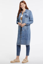 Load image into Gallery viewer, Distressed. Denim. Duster length. What more could we ask for in an updated twist on a classic jean jacket? Add unexpected flair to any casual look and watch the compliments pour in, no matter how you style this effortless piece.

