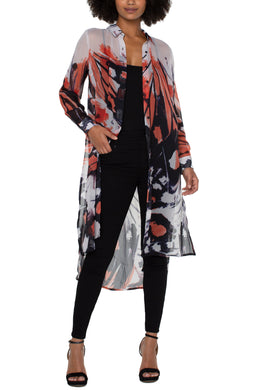 The butterfly is a symbol of new beginnings with rich glowing colors, bold butterfly wing patterns and new silhouettes.  This flowing knee-length chiffon printed blouse is chic and elevated! Looks fabulous when worn with a black cami or one of our Strap-It bras.  Where open as a duster or closed and pair with denim or a great legging.