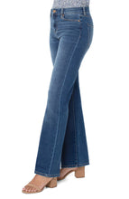 Load image into Gallery viewer, The Lucy bootcut jean is sleek and sophisticated!  This fabulous jean is slimming through the hips and thighs and releases at the knee and leg opening to create the beautiful bootcut shape. Add your favorite top, heeled sandals or boots and you&#39;re ready to conquer the day!  Color- Yuba; a rich blue. 32&#39;&#39; Inseam. Five-pocket styling details. Set-in waistband with belt loops.
