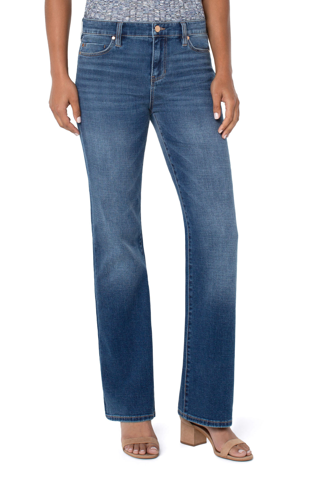 The Lucy bootcut jean is sleek and sophisticated!  This fabulous jean is slimming through the hips and thighs and releases at the knee and leg opening to create the beautiful bootcut shape. Add your favorite top, heeled sandals or boots and you're ready to conquer the day!  Color- Yuba; a rich blue. 32'' Inseam. Five-pocket styling details. Set-in waistband with belt loops.