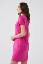 Load image into Gallery viewer, An everyday essential, our polo dress in a brilliant magenta color is an easy and comfortable style for almost every occasion. Whether you are going to the grocery store or a golf session during your vacation, this is the dress you will want to wear again and again.  Color- Magenta Pull-over. Polo style. Short sleeve.
