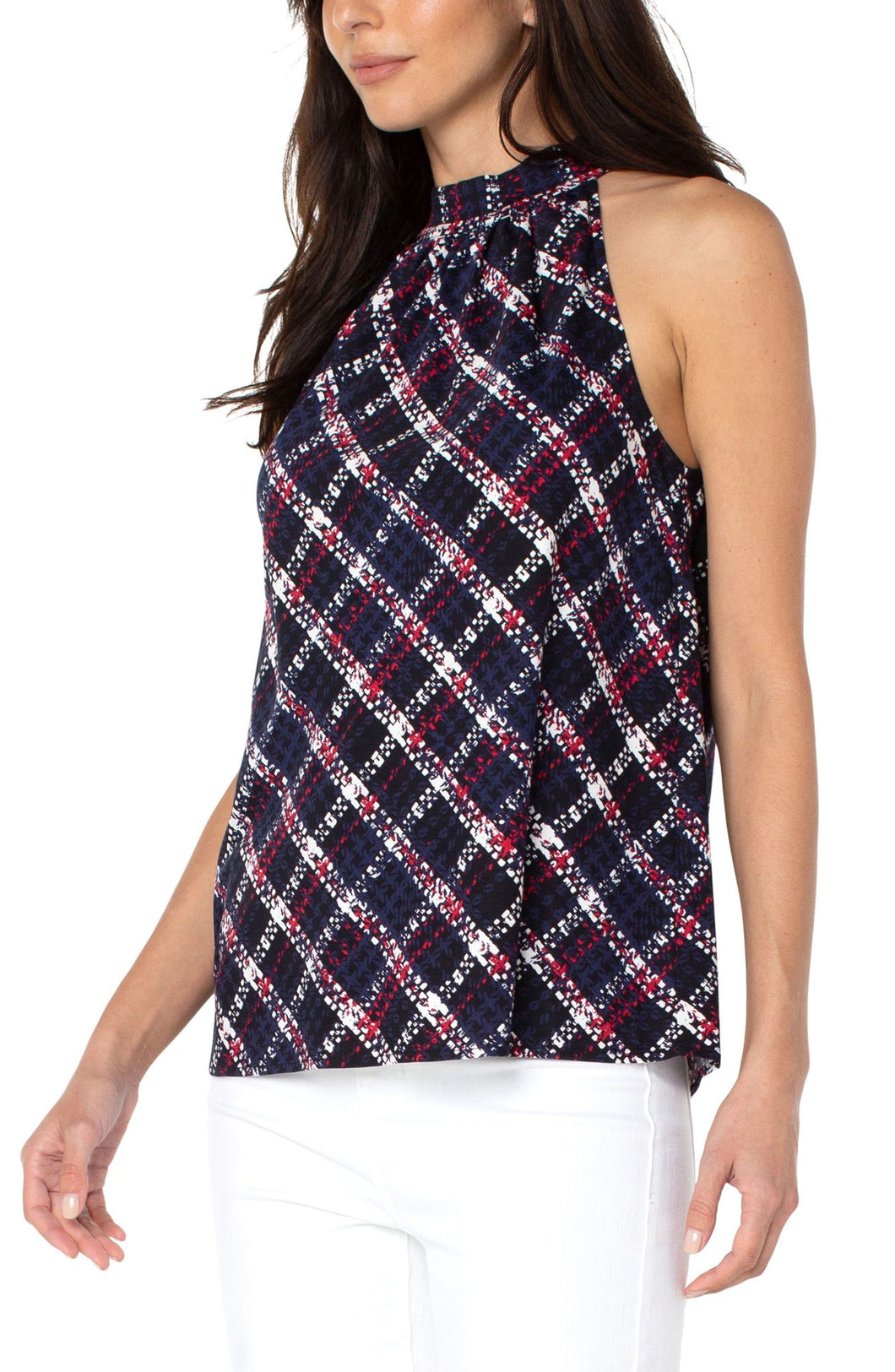 A beautiful statement piece, this sleeveless mock neck tank will take you effortlessly from day to evening. Unique textured plaid in colors of lollipop red, white and navy pairs beautifully with jeans, white bottoms and shorts. Textured bold stripes crisscross and give this fabulous top a chic look. 