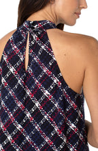 Load image into Gallery viewer, A beautiful statement piece, this sleeveless mock neck tank will take you effortlessly from day to evening. Unique textured plaid in colors of lollipop red, white and navy pairs beautifully with jeans, white bottoms and shorts. Textured bold stripes crisscross and give this fabulous top a chic look. 
