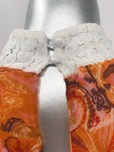 Load image into Gallery viewer, A striking orange with splashes of pink, white and dark gray come together to create a gorgeous, flowy, sleeveless top that will get you compliments!  A beautiful ivory colored lace collar gives even greater interest to this already stunning top.  Looks fabulous paired with white or black pants, jeans or shorts.  Dress up or dress casually.  This top is so very versatile!
