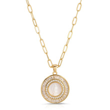 Load image into Gallery viewer, This gorgeous Mother Mary Necklace features a silhouette of Mary in genuine mother of pearl in a gold setting surrounded by cubic zirconia baguette accents. Pendant hangs from a drawn cable chain. 
