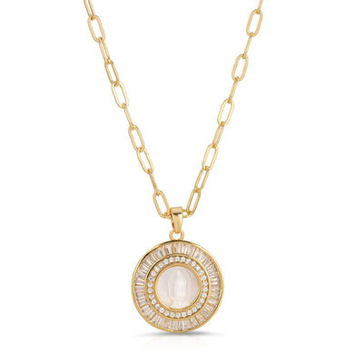 This gorgeous Mother Mary Necklace features a silhouette of Mary in genuine mother of pearl in a gold setting surrounded by cubic zirconia baguette accents. Pendant hangs from a drawn cable chain. 