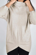 Load image into Gallery viewer, A gorgeous neutral oatmeal color sweater is a style that virtually matches perfectly with any of your favorite bottoms. This so soft and classy sweater features dolman sleeves ribbed mock neck and sleeves, and a seam down the center. The chevron stitching details on the front, give this gorgeous sweater even greater interest.   Color- Oatmeal Chevron detailing on front. Ribbed mock neck and sleeves. Center seam. Soft fabrication. Longer length.
