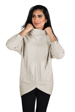 A gorgeous neutral oatmeal color sweater is a style that virtually matches perfectly with any of your favorite bottoms. This so soft and classy sweater features dolman sleeves ribbed mock neck and sleeves, and a seam down the center. The chevron stitching details on the front, give this gorgeous sweater even greater interest.   Color- Oatmeal Chevron detailing on front. Ribbed mock neck and sleeves. Center seam. Soft fabrication. Longer length.