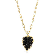 Load image into Gallery viewer, A gorgeous necklace in black onyx looks stunning with almost every outfit. Elevate your outfit with this hand-carved genuine black onyx leaf surrounded by a gold border with dainty cubic zirconia prongs.
