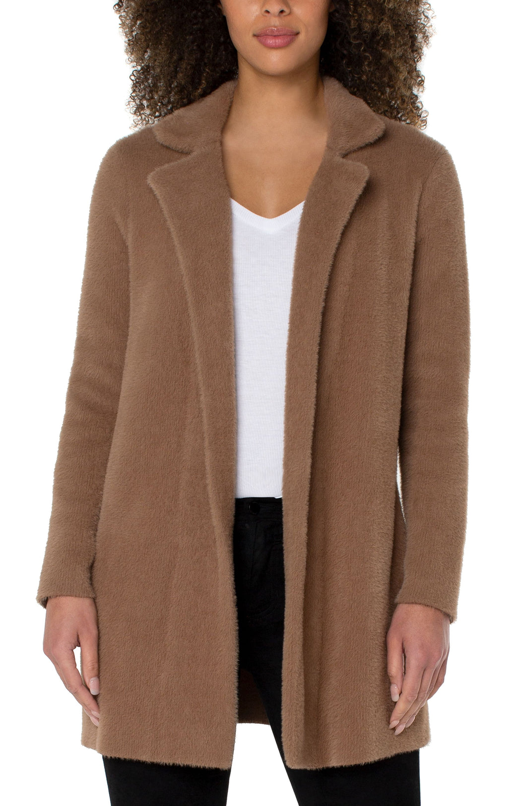 A beautiful combination of a cardigan and a coat creates a coatigan that is warm enough to wear during those cold nights but comfortable enough to wear indoors. Soft and fuzzy, you will wrap yourself in comfort each time you put on this fabulous coatigan. Featuring a beautiful camel color, this coatigan pairs well with denim, trousers or leggings! 