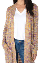 Load image into Gallery viewer, This Open Front Cardigan Sweater is an effortlessly chic layering piece.  Pairs well with denim and is perfect for transitional weather. Layer over your favorite matching tee for a fashionable look or pair with our matching QUINCY SLEEVELESS SWEATER IN GOLD, PURPLE AND TURQUOISE SPACE DYE for the perfect fashionista look!  Color- Space dye; purple, gold, turquoise, white. Open front. Long sleeves with ribbed cuffs.
