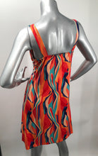 Load image into Gallery viewer, Nothing says summer like a vibrant multi color Grecian dress.  Simply breathtaking in design and ultra-cool fabrication with a satiny feel, this dress will be the focal point of any summer event.  A fabulous dress to take on vacation, it is easy to wear and can be worn for so many occasions.  You&#39;ll look just like a goddess in this stunning style!
