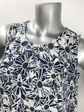 Load image into Gallery viewer, Daisies in navy, white and gray dance on this lovely sleeveless top by Papillon.  The color combination makes it a very versatile top to pair with so many different bottoms from jeans to skirts and everything in-between.  
