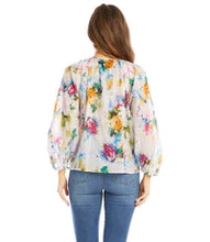 Load image into Gallery viewer, Our stunning Adel Peasant Top offers an attractive abstract floral print in bold, beautiful colors creating a stunning style. This lovely peasant top by Karen Kane features billowy blouson sleeves and a split neck with ties. Effortlessly pair with jeans or shorts for a more casual look or dress up with a skirt of pants for a dressier vibe.

