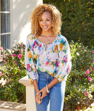 Load image into Gallery viewer, Our stunning Adel Peasant Top offers an attractive abstract floral print in bold, beautiful colors creating a stunning style. This lovely peasant top by Karen Kane features billowy blouson sleeves and a split neck with ties. Effortlessly pair with jeans or shorts for a more casual look or dress up with a skirt of pants for a dressier vibe.
