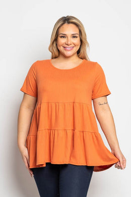 A lovely orange color makes this tiered baby doll top really pop!  A comfortable fit, our Kenna makes an ideal top to pair with so many different bottoms.  