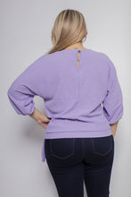 Load image into Gallery viewer, A lovely lavender color top, our Leeann faux wrap side tie blouse is a perfect top for every season.  With the lightweight linen feel, you will be sure to remain cool and comfortable during those hot, humid days while looking stylish.  The details are in the design and this top does not disappoint with its faux wrap front and side tie, stretch banded bottom and 3/4 sleeves.  A keyhole button closure is found in the back at the neckline.  Color- Lavender. 3/4 sleeves.
