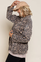 Load image into Gallery viewer, If you are looking for something new with a vintage vibe, our Virginia jacket is the perfect transitional jacket for you.  Designed with a relaxed fit, the Virginia jacket has a hidden placket and zipper closure on center front and a great leopard print. Comes with a four-pouch pocket on front with an adjustable strap on the waistband and finished with distressed detail throughout the garment for vintage look.  Color-Light brown base with black leopard print. Relaxed fit; no stretch.
