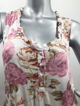 Load image into Gallery viewer, If you are looking for a summer dress that can be worn for many occasions, our Polly Pink Floral Two-Tiered White Ruffle Hem Dress is the one!  A beautiful pink and light olive-green floral pattern on a white background creates a feminine flair while the two-tiered hem with white ruffles creates a fashionable look.  
