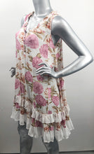 Load image into Gallery viewer, If you are looking for a summer dress that can be worn for many occasions, our Polly Pink Floral Two-Tiered White Ruffle Hem Dress is the one!  A beautiful pink and light olive-green floral pattern on a white background creates a feminine flair while the two-tiered hem with white ruffles creates a fashionable look.  
