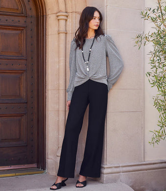 Cleanly styled pants in a sophisticated wide-leg cut are tailored from stretchy double face crepe for ultimate comfort. Pair these pants with a sparkly or satin top for a polished holiday look.  Color- Black. Length: Full length. Double face crepe. Elasticized waistband. Wide leg.