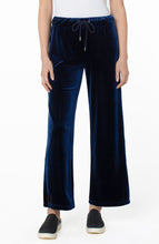 Load image into Gallery viewer, Get cozy and escape the crazy with this super soft and comfortable wide leg pant with drawcord.  A stylish fit, this beautiful pant wows with its striking midnight blue color.  A perfect style to spend your entire day in, you will find yourself choosing to wear this pant again and again.
