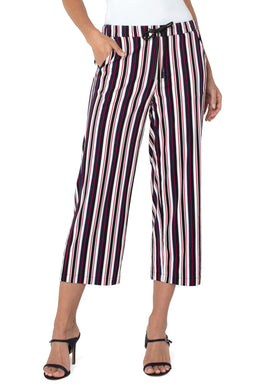 You can't go wrong with this lovely knit pull-on trouser. Not only is this wide leg pant so very chic, but also extremely comfortable. Vertical stripes in navy, red and white are  flattering to the figure. Easy to wear, this pant pairs perfectly with a tee-shirt or solid color top and looks fashionable when worn with our Ember Classic Jean Jacket.