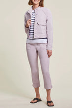 Load image into Gallery viewer, An easy and stylish crop, our Posie pull on crop in a beautiful soft lilac color called grapemist will become your go to pant of the season.  Perfect stretch and a button tab accent detail at the hemline gives this pant an edge. Pair with your favorite white or black tee and a pair of tennis shoes or sandals and you&#39;re ready to face the day in style.  Color- Grapemist; soft lilac. Perfect stretch. Pull-on.
