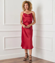 Load image into Gallery viewer, Cut from luxurious vintage heavy satin, this top is detailed with an alluring draped neckline. The perfect layering piece - soft, shimmering, and easy to dress up or down. Color- Choice of red or ivory. Adjustable straps. Lined. Vintage heavy satin.
