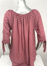 Load image into Gallery viewer, Our Rylee Raspberry Tie Sleeve Top is so versatile.  With a raspberry and tan color geometric pattern, you create so many different looks with this lovely top.  Pair with tan, white or black bottoms to create a dressier look or wear with jeans for a more casual look.  
